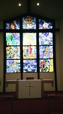 A link to the large view of the stain glass window at St Peter the Fisherman Lutheran Church.  Copyright 1986